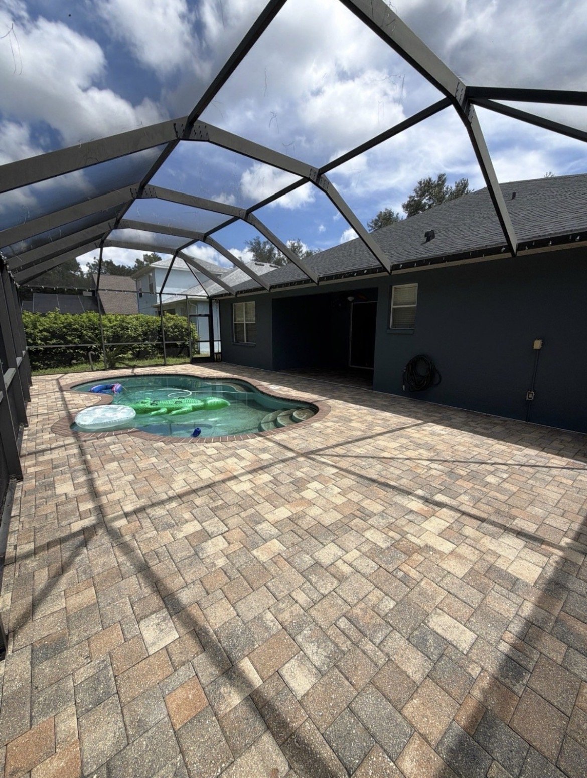 Completed Pure Blue paver restoration around a pool