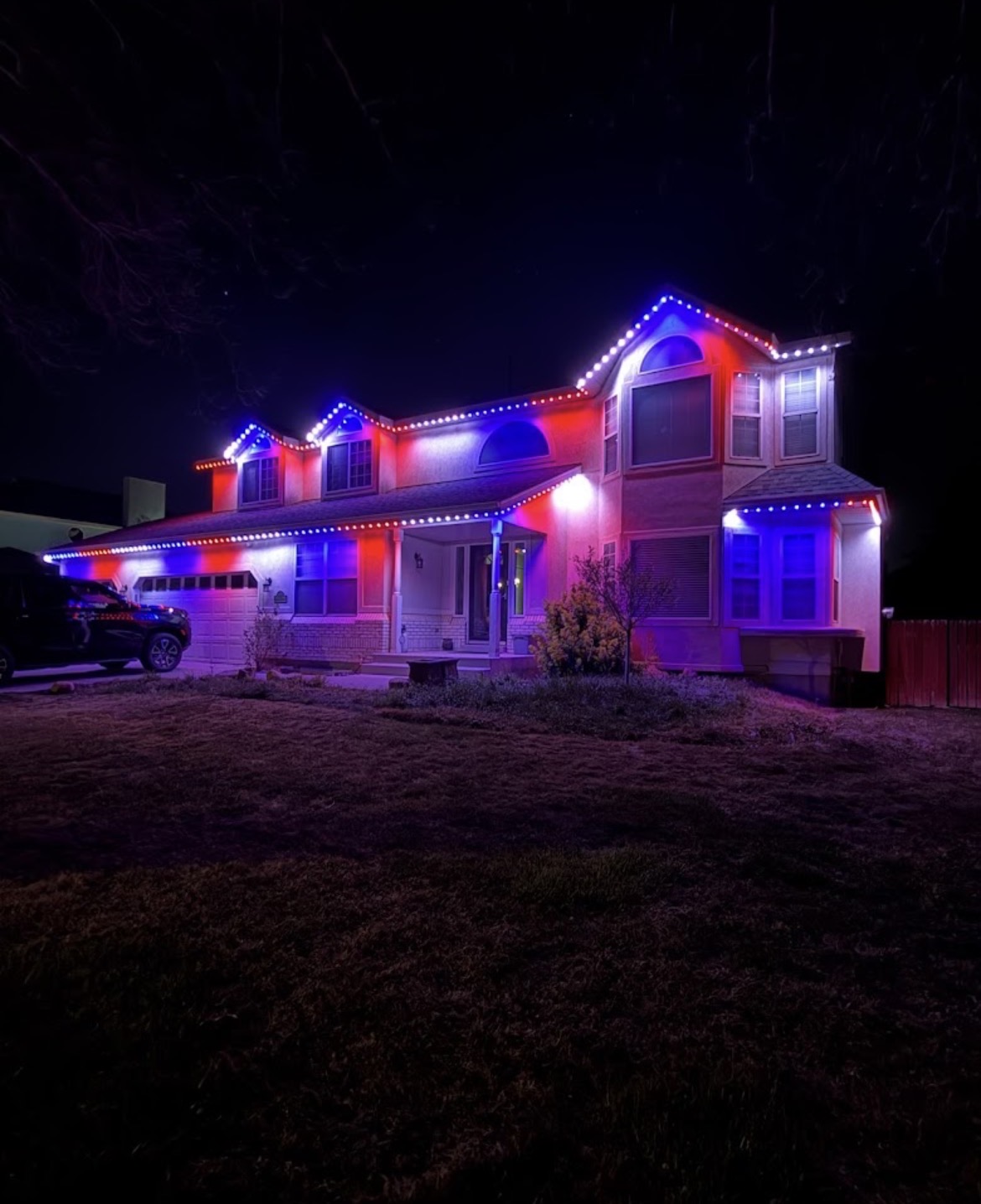 Permanent exterior LEDs displaying a red blue and white scene